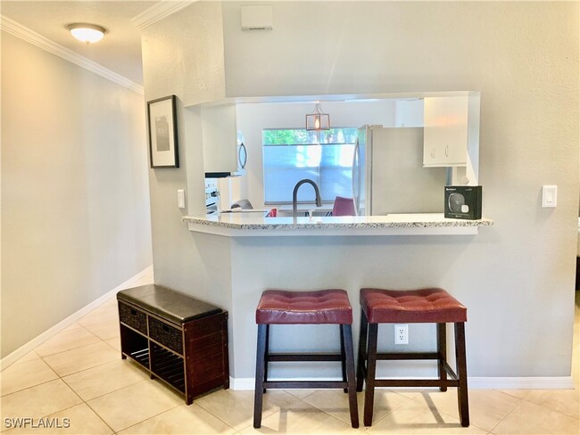 157 Wading Bird Cir in Naples, FL - Foto de edificio - Building Photo