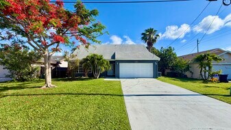 6048 Garrett St in Jupiter, FL - Building Photo