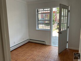 49 AVENUE, Unit 1 in Queens, NY - Building Photo