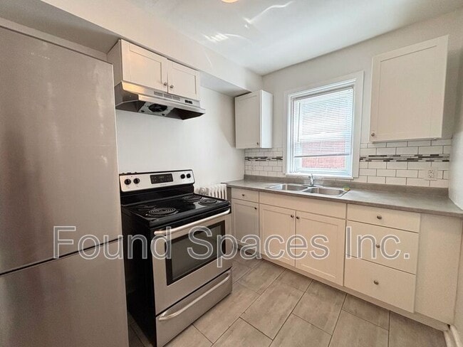 property at 83 East Ave