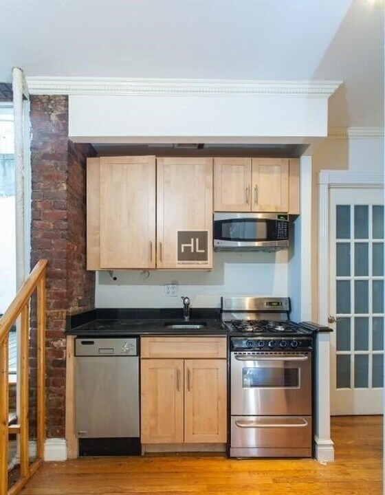 E 13TH ST., Unit 2C in New York, NY - Building Photo