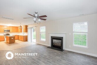 6817 Thistle Down Dr in Harrisburg, NC - Building Photo - Building Photo