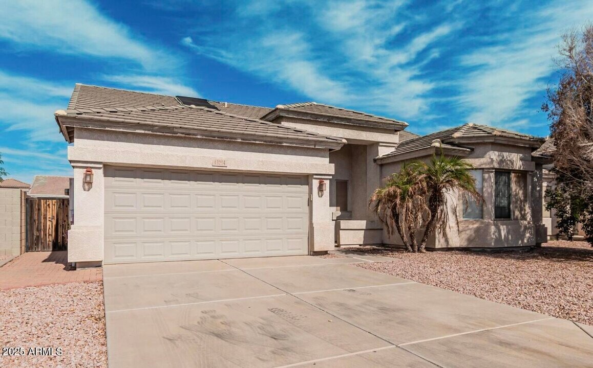 13014 W Surrey Ave in El Mirage, AZ - Building Photo