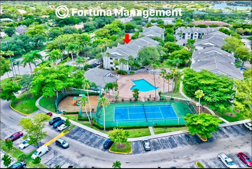 11295 W Atlantic Blvd, Unit A-104 Atlantic Sperings in Coral Springs, FL - Building Photo