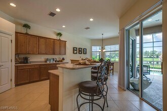 6101 Dogleg Dr in Naples, FL - Building Photo - Building Photo