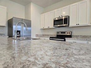 1409 Yellow Finch Dr in Davenport, FL - Building Photo - Building Photo