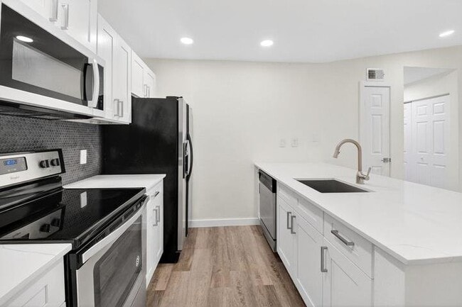 property at 1825 Palm Cove Blvd