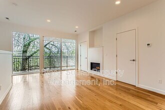 1030 N Ainsworth St in Portland, OR - Building Photo - Building Photo