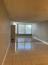 1401 NE 191st St-Unit -D309 in Miami, FL - Building Photo - Building Photo