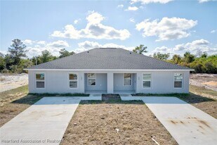 293 Lincoln Rd NE in Lake Placid, FL - Building Photo