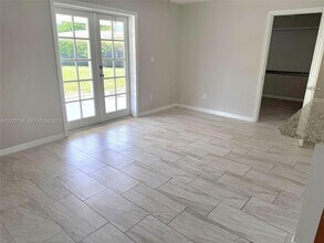 1104 E Jasmine Rd in Lehigh Acres, FL - Building Photo - Building Photo