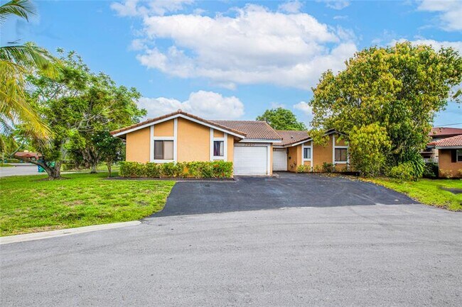 property at 7942 NW 37th Dr