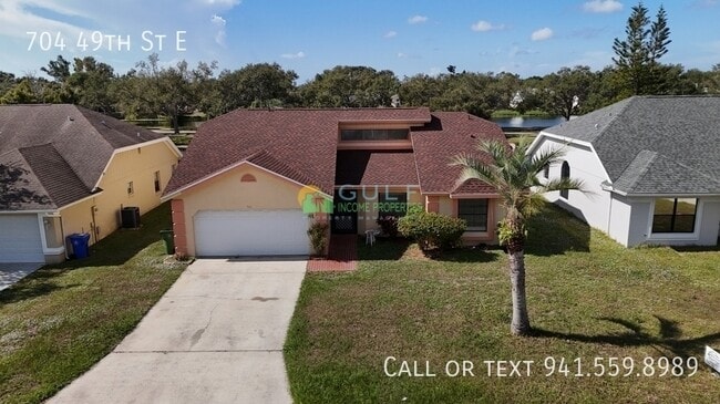 property at 704 49th St E