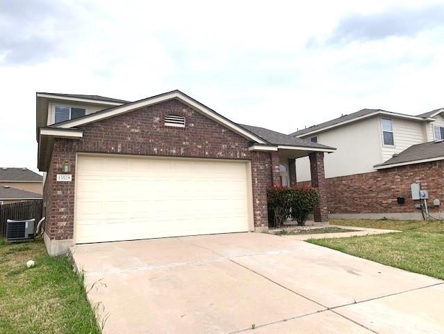 13528 James Garfield St in Manor, TX - Building Photo