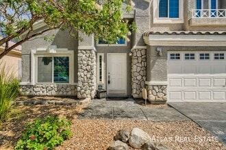 7716 Robinglen Ave in Las Vegas, NV - Building Photo - Building Photo