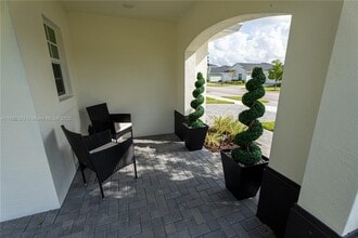 6172 NW Sweetwood Dr in Port St. Lucie, FL - Building Photo - Building Photo