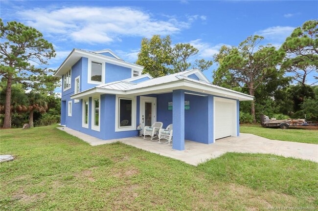 property at 64 NE Acacia Trail