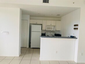 1943 Marsh Harbor Dr-Unit -301 in Riviera Beach, FL - Building Photo - Building Photo