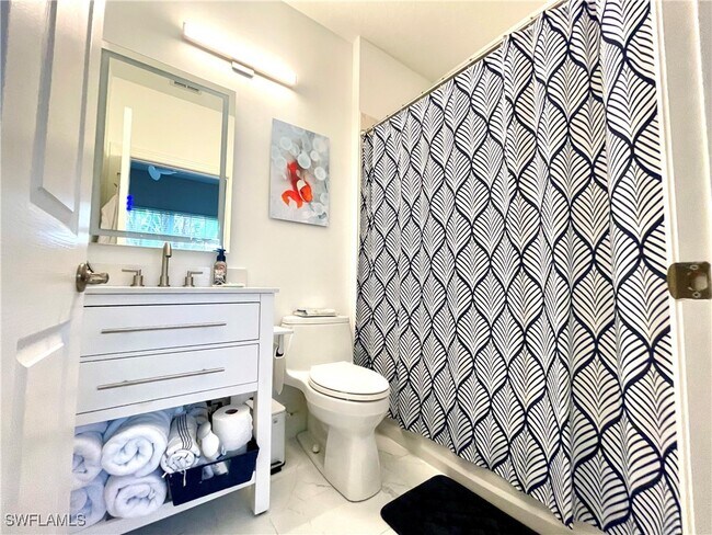 property at 9024 Whimbrel Watch Ln