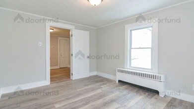 11 Pleasant St in Franklin, NH - Building Photo - Building Photo