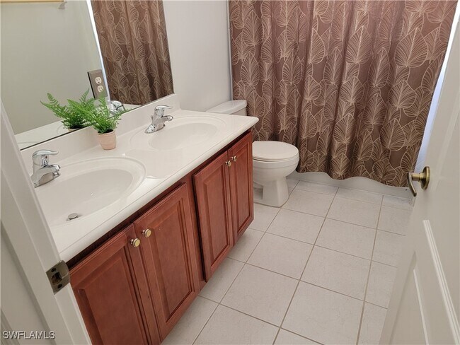 7051 Ambrosia Ln in Naples, FL - Building Photo - Building Photo