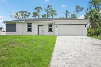 11992 Atoll Ave in Port Charlotte, FL - Building Photo - Building Photo