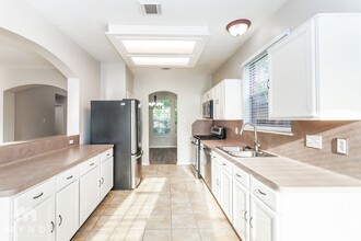 31530 Kingston Village Dr in Spring, TX - Building Photo - Building Photo