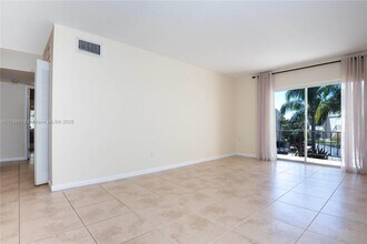 13903 SW 90th Ave, Unit 214E in Miami, FL - Building Photo - Building Photo