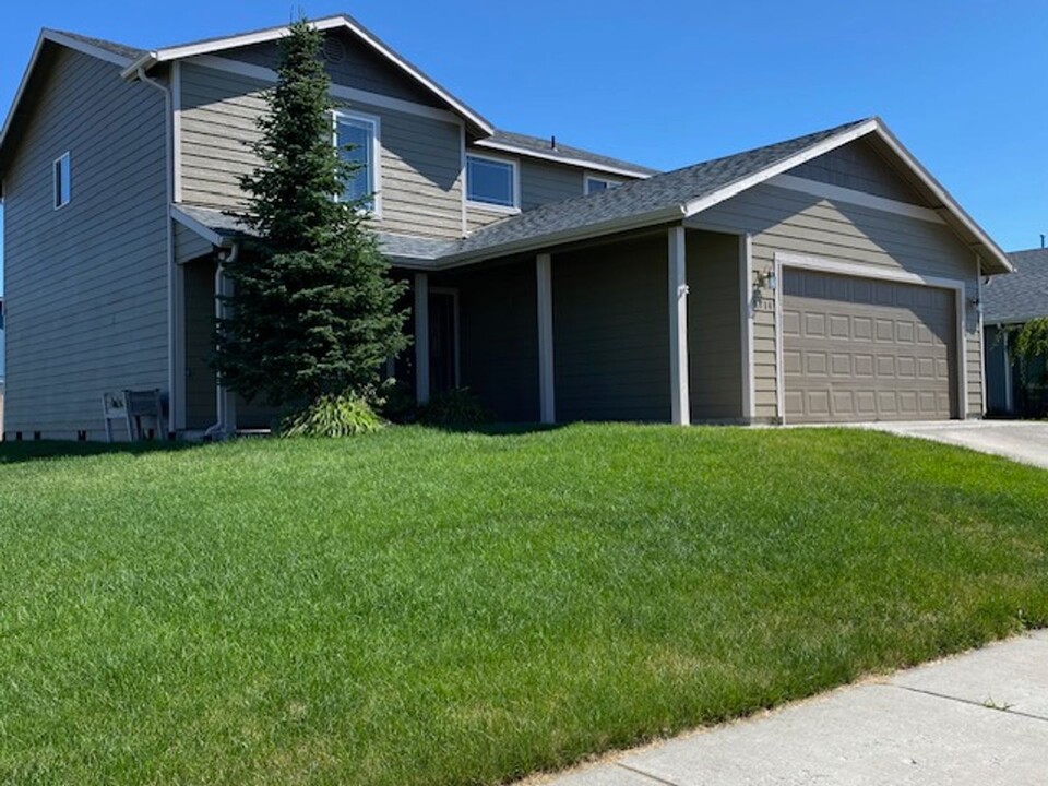 9714 W Caelen Ave in Cheney, WA - Building Photo