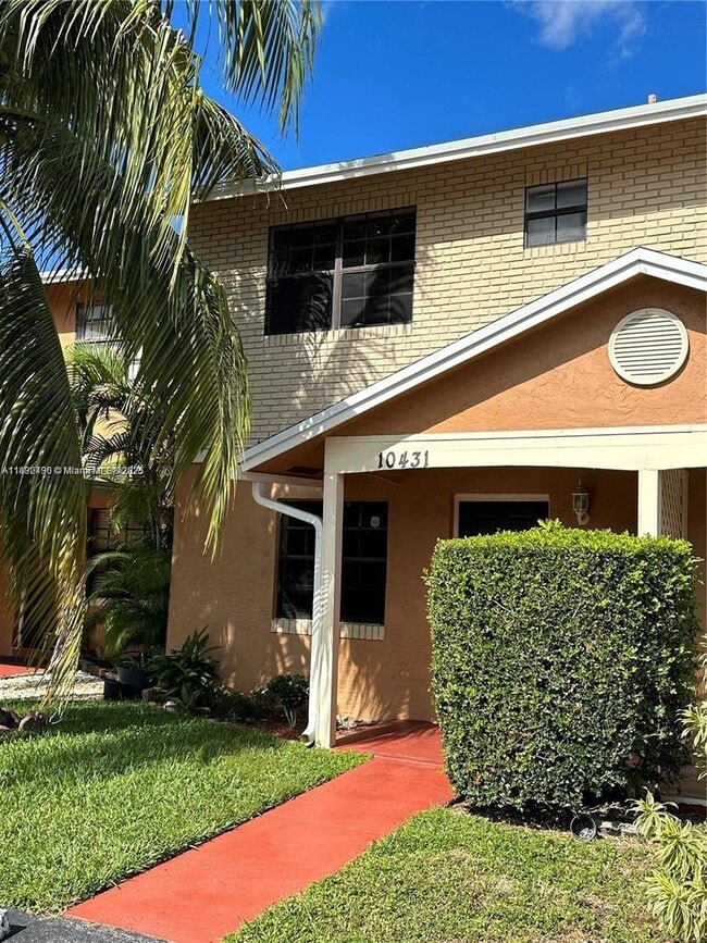 property at 10431 NW 3rd St