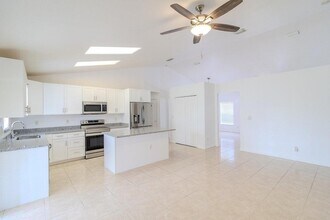 3631 SW Kasin St in Port St. Lucie, FL - Building Photo - Building Photo
