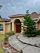 2471 SW Madiera St in Port St. Lucie, FL - Building Photo - Building Photo