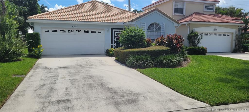 2241 SW Olympic Club Terrace in Palm City, FL - Building Photo
