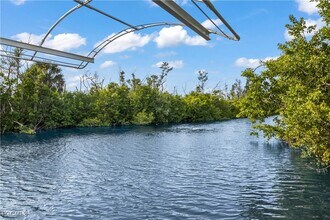 7150 Cobiac Dr in Saint James City, FL - Building Photo - Building Photo