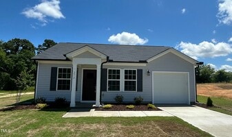 272 Johnson Rdg Wy in Four Oaks, NC - Building Photo