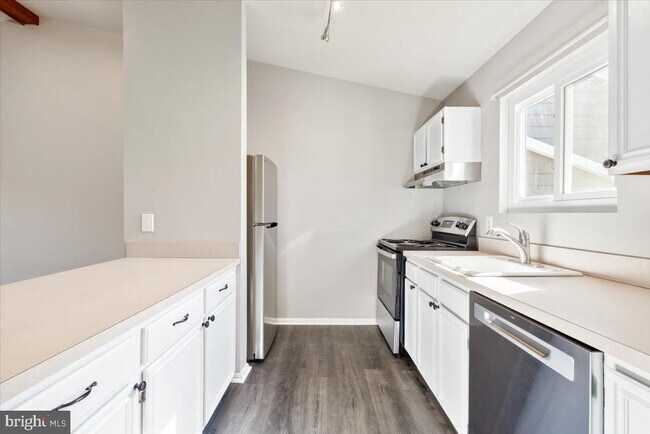 10287 White Pelican Way-Unit -101E in New Market, MD - Building Photo - Building Photo
