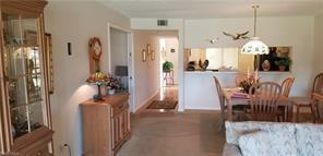 5754 Deauville Cir-Unit -E108 in Naples, FL - Foto de edificio - Building Photo