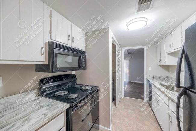 property at 6424 Woodstone Way