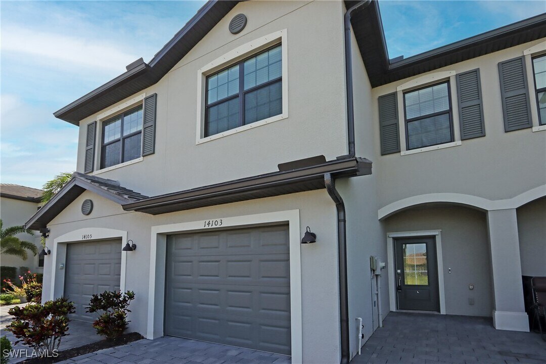 14103 Pine Lodge Ln in Miromar Lakes, FL - Building Photo