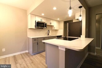 2249 Castle Rock Square, Unit 11C in Reston, VA - Building Photo - Building Photo