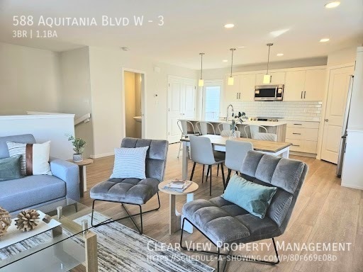 588 Aquitania Blvd W in Lethbridge, AB - Building Photo - Building Photo