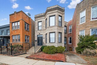 7038 S Eberhart Ave, Unit 1 in Chicago, IL - Building Photo - Building Photo