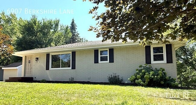 property at 6907 Berkshire Ln N