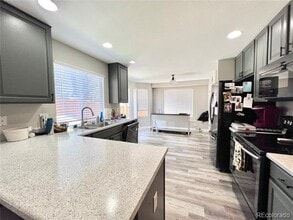 16183 E 104th Way in Commerce City, CO - Building Photo - Building Photo