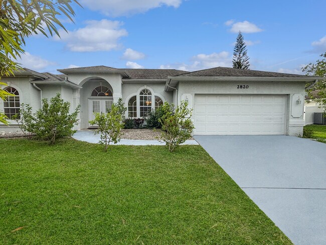 property at 2820 SE Melaleuca Blvd