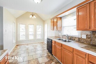 14504 Laquinta Dr in Grandview, MO - Building Photo - Building Photo