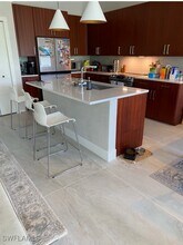 5717 Lago Villaggio Way in Naples, FL - Building Photo - Building Photo