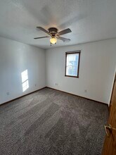 109 W Pleasant St in Knoxville, IA - Building Photo - Building Photo