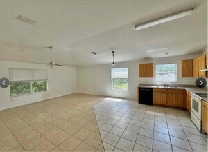 128 Plainview Dr-Unit -A in Palm Coast, FL - Building Photo - Building Photo