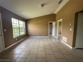743 Ivan Ave S in Lehigh Acres, FL - Building Photo - Building Photo